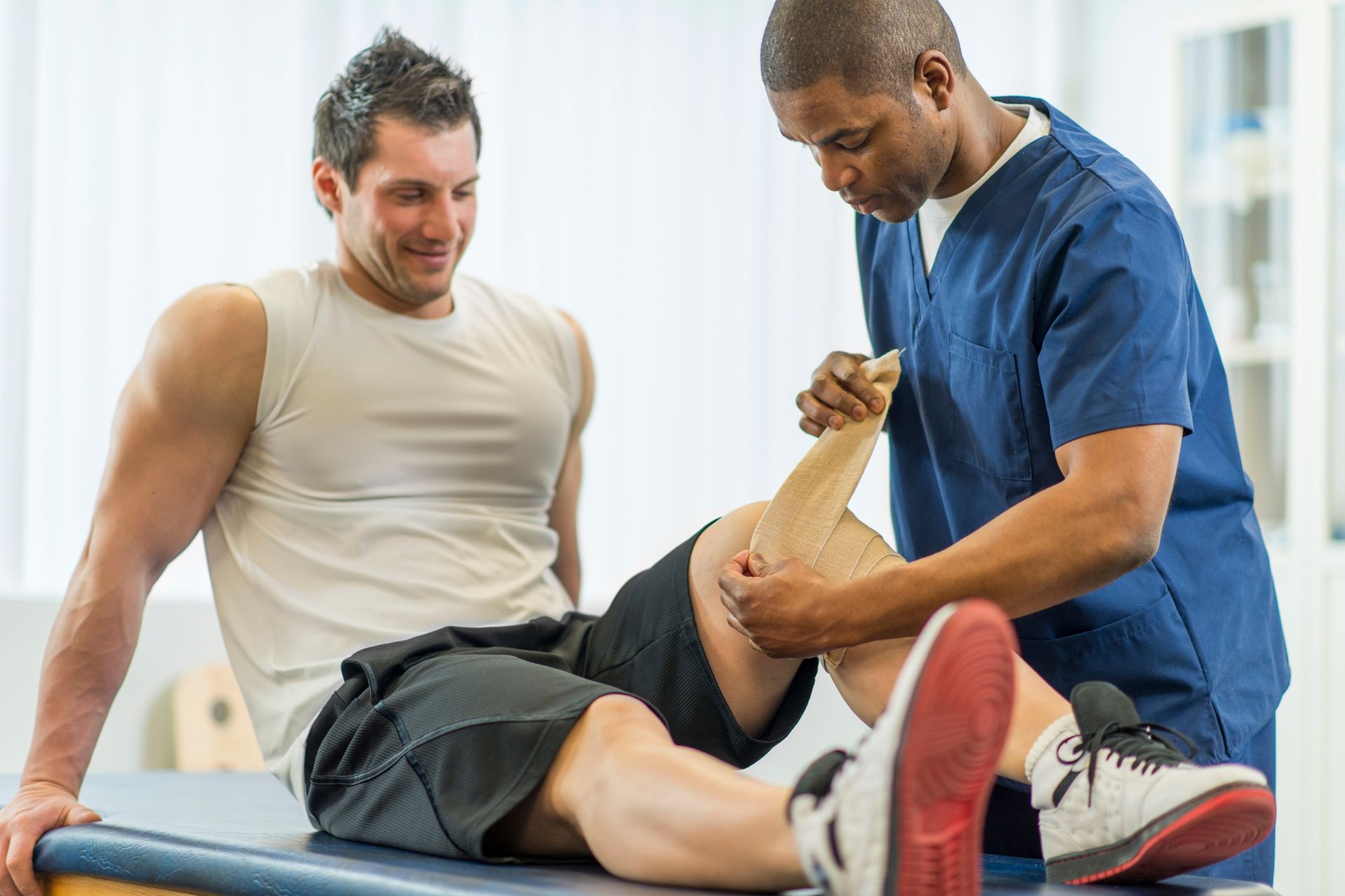 What is the mechanism of action behind therapeutic ultrasound in treating muscle strains?